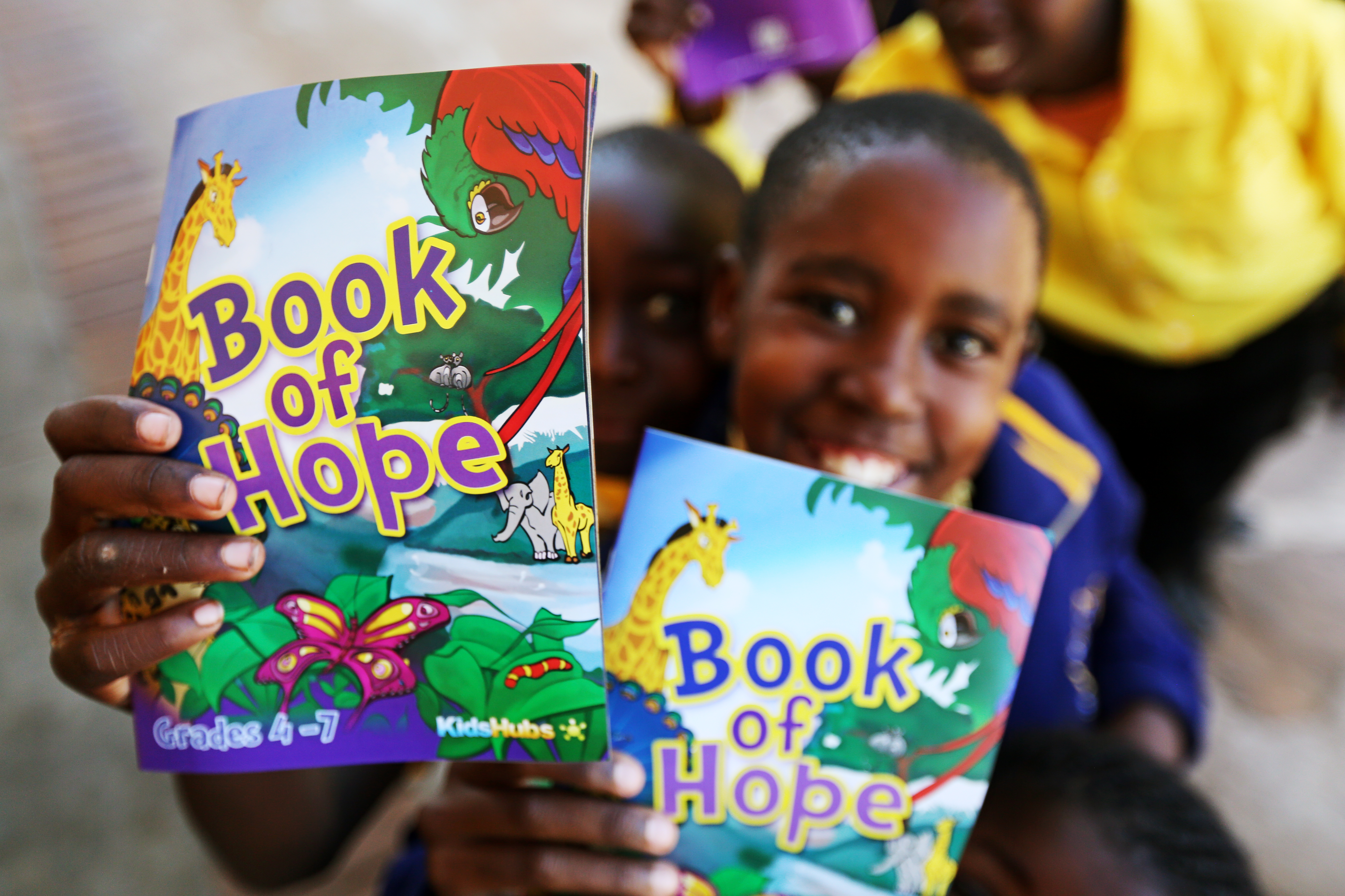 <span  class="uc_style_uc_tiles_grid_image_elementor_uc_items_attribute_title" style="color:#ffffff;">kid with book of hope</span>